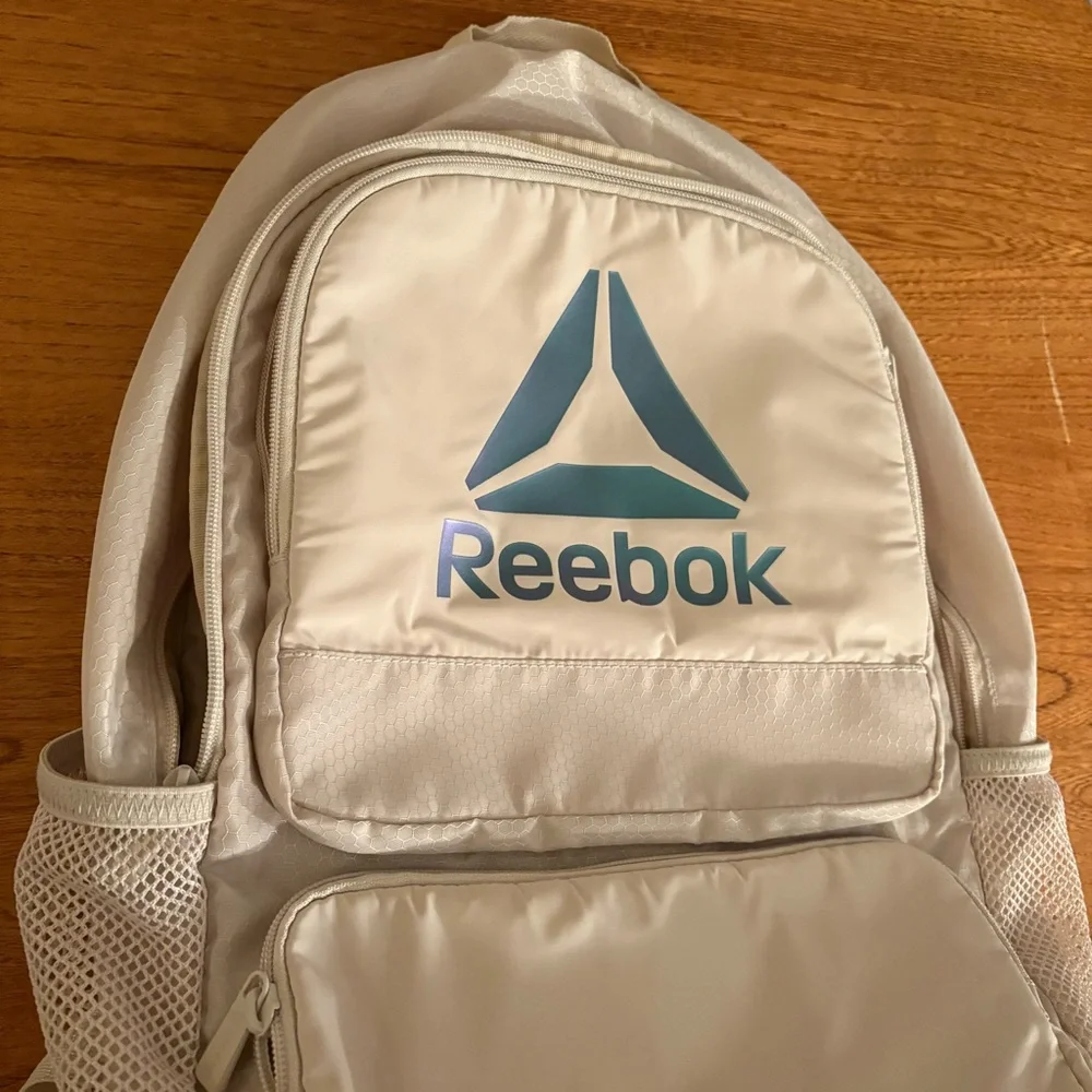 Reebok Adult Laptop Paige Backpack Iridescent Logo, Pumice Stone, Tan Cream Zip